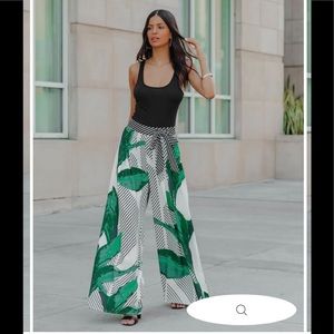 NWOT- In bag from VICI. Curaçao Palazzo Palm Pants